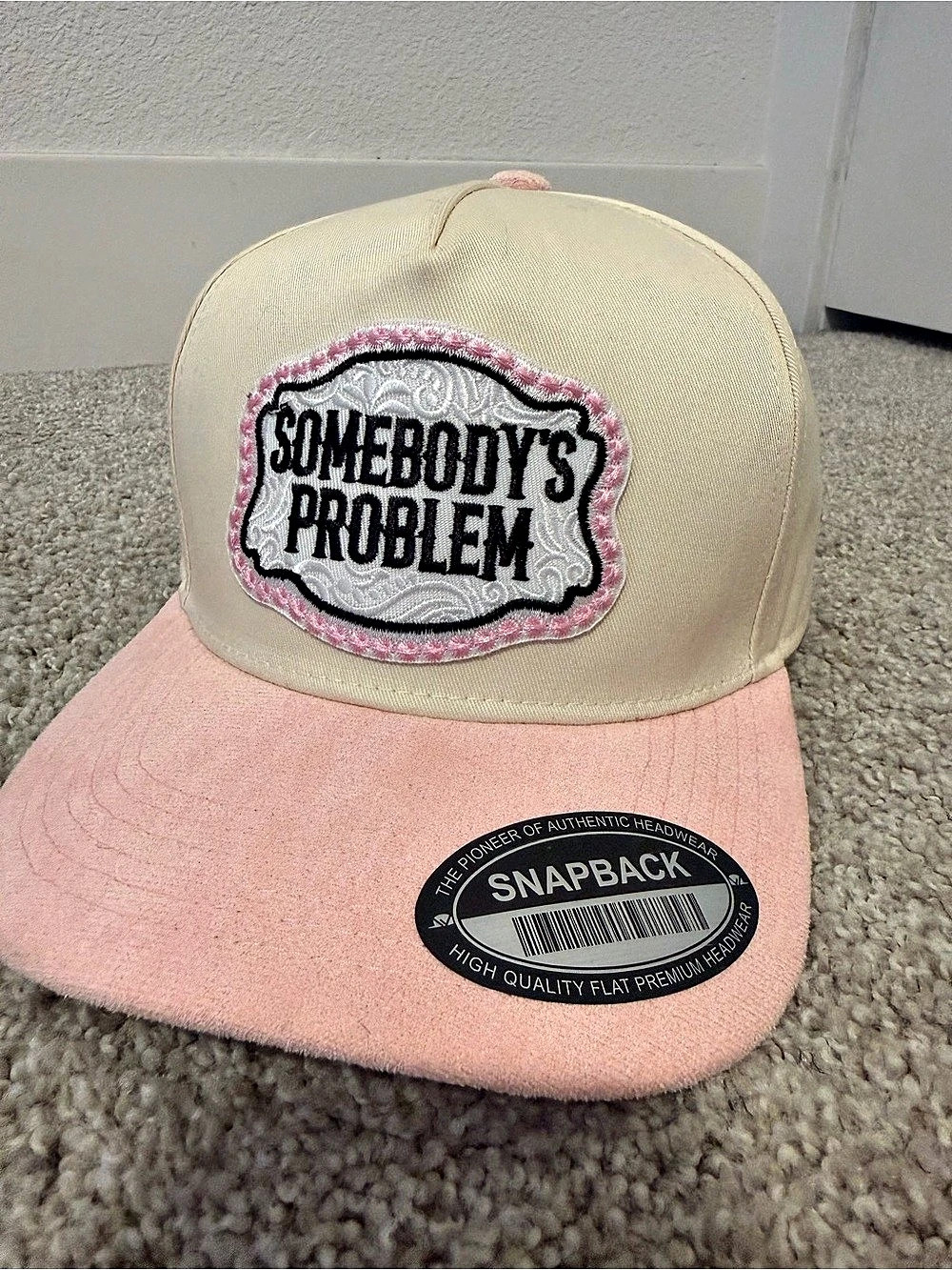 Snapback Somebody's Problem Pink & Cream Trucker Hat
